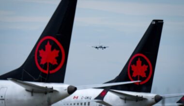 Canadian airlines hit by soaring jet fuel costs balance hedging and increasing ticket prices
