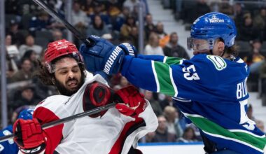Beleaguered Vancouver Canucks show fight in loss to high-powered Carolina Hurricanes