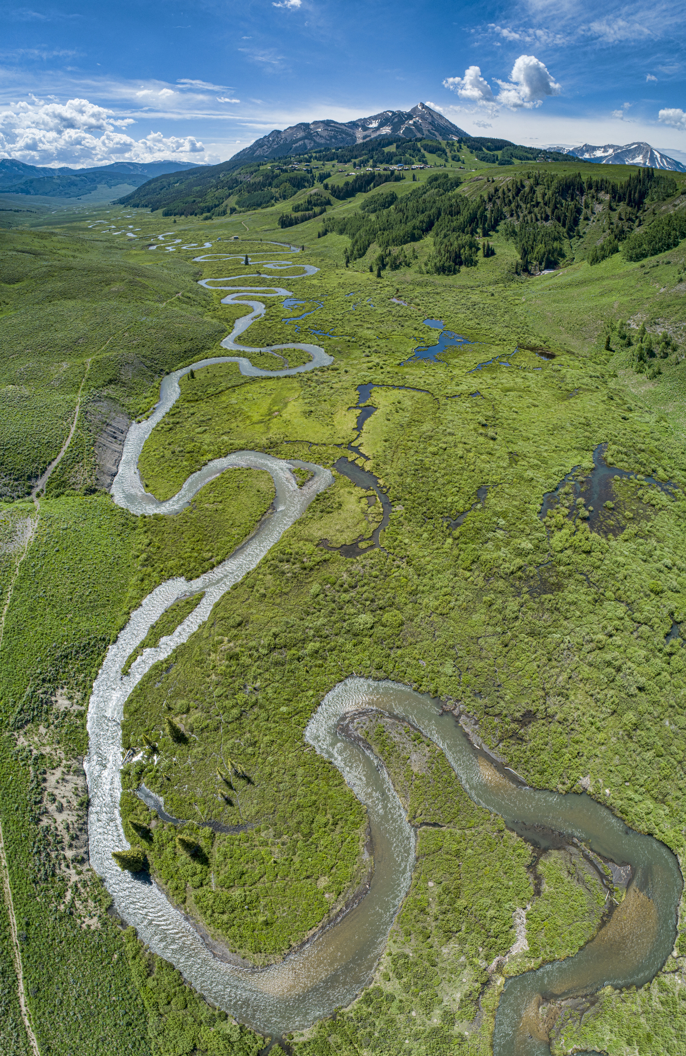 Drone photograph of East River meandering toward Crested Butte Mountain