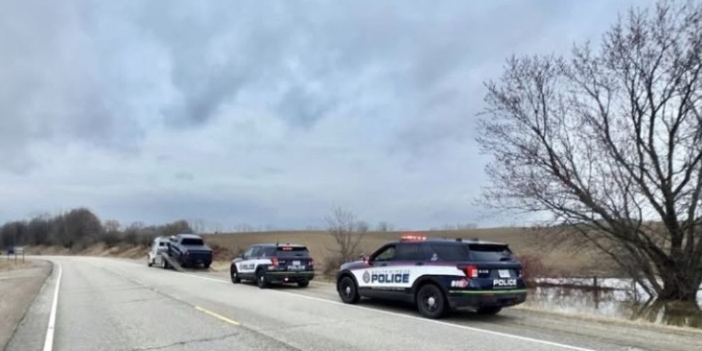 Vehicle loaded onto a tow truck after South Simcoe Police charged a driver with stunt driving on County Road 27 in Bradford West Gwillimbury.