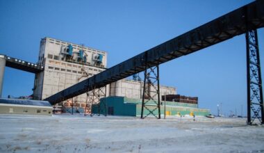 A port building against an icy landscape.