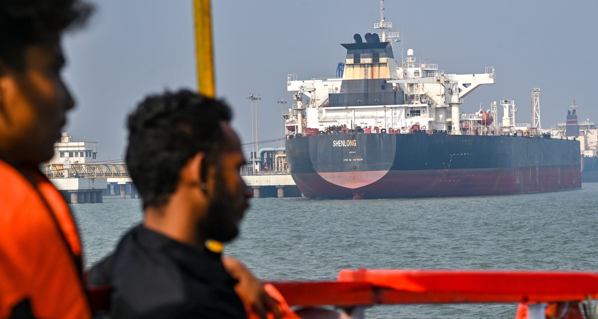 MUMBAI, INDIA – MARCH 12: The Liberia-flagged crude oil tanker Shenlong Suezmax successfully docked at Mumbai Port after navigating the high-risk Strait of Hormuz amid the intensifying West Asia conflict on March 11, 2026 in Mumbai, India. The vessel, which arrived from Saudi Arabia’s Ras Tanura port, is the first India-bound tanker to pierce the de facto maritime blockade following recent military strikes involving the U.S., Israel, and Iran. (Photo by Raju Shinde/Hindustan Times/Sipa USA)