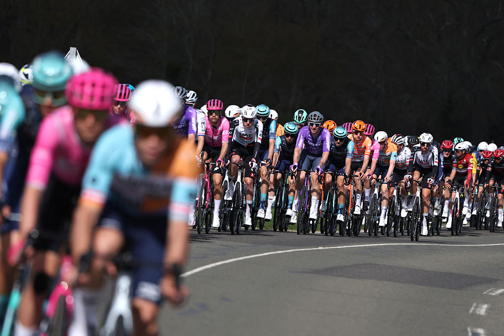 The pack rides during the 2nd stage of the Paris-Nice cycling race, 187 km between &Eacute;p&ocirc;ne and Montargis, on March 9, 2026. (Photo by Anne-Christine POUJOULAT / AFP)