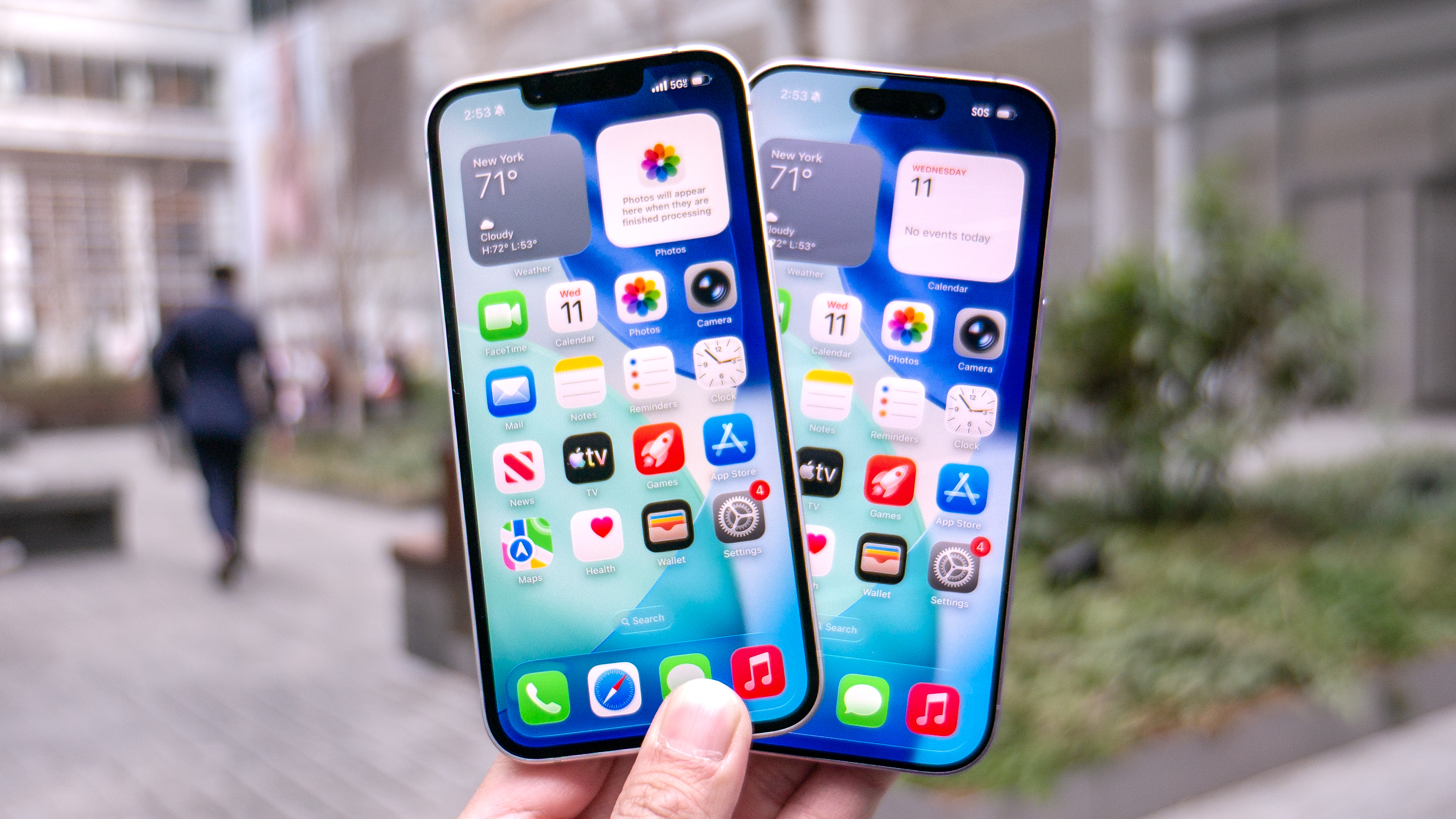 iPhone 17e vs iPhone 17 held in the hand.