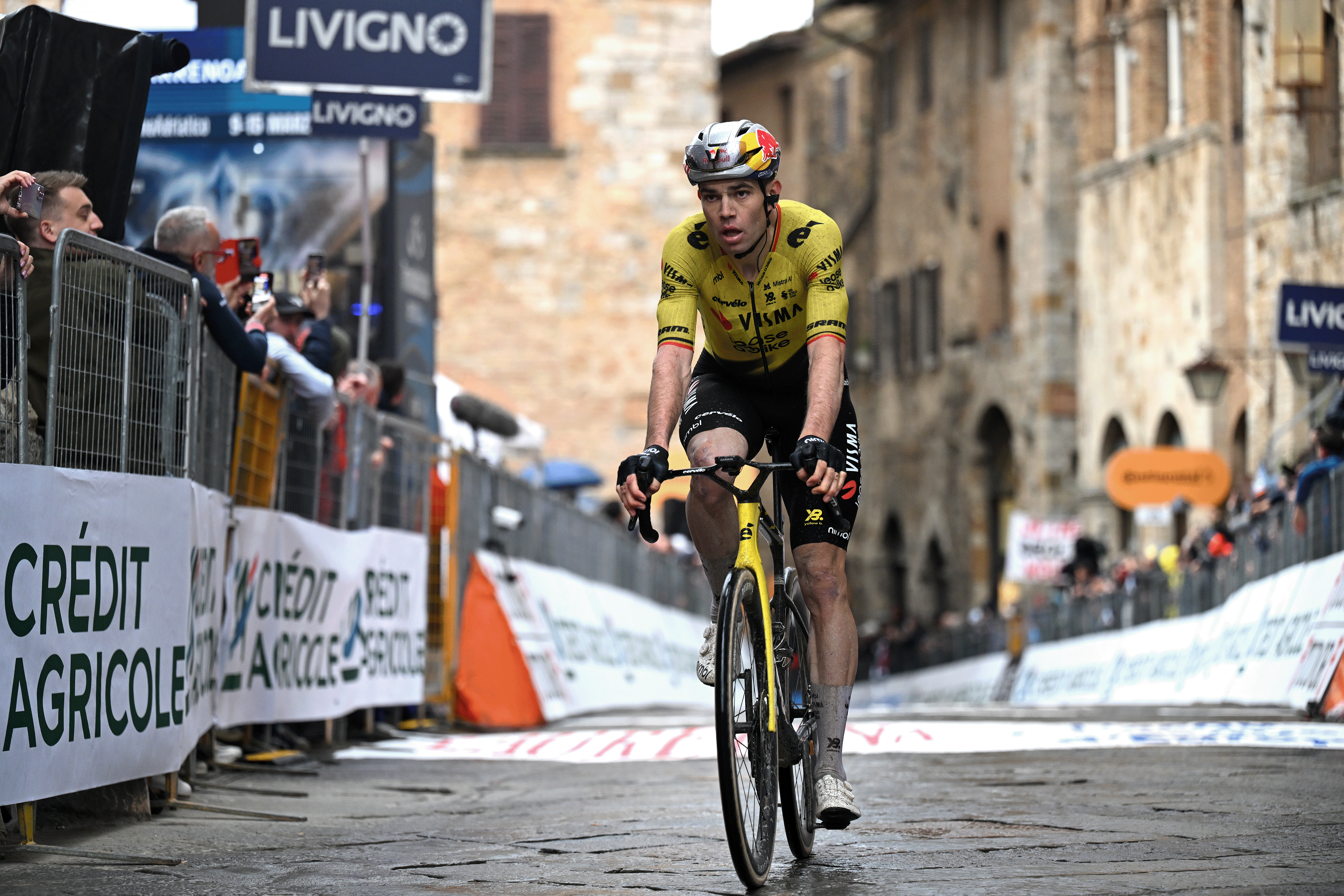 SAN GIMIGNANO, ITALY - MARCH 10: Wout van Aert of Belgium and Team Visma | Lease a Bike crosses the finish line during the 61st Tirreno-Adriatico 2026, Stage 2 a 206km stage from Camaiore to San Gimignano 332m / #UCIWT / on March 10, 2026 in San Gimignano, Italy. (Photo by Tim de Waele/Getty Images)