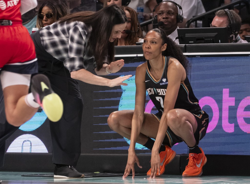 Rebekah Gardner, who is now a reserved free agent, listens to instructions former Liberty coach Sandy Brondello during a game last season.