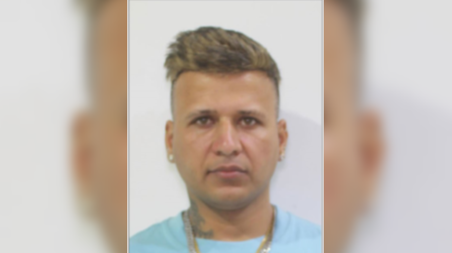 Image of a gavel and law books, symbolizing legal action against fraud.