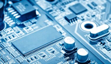 A semiconductor chip and technology in blue lighting.