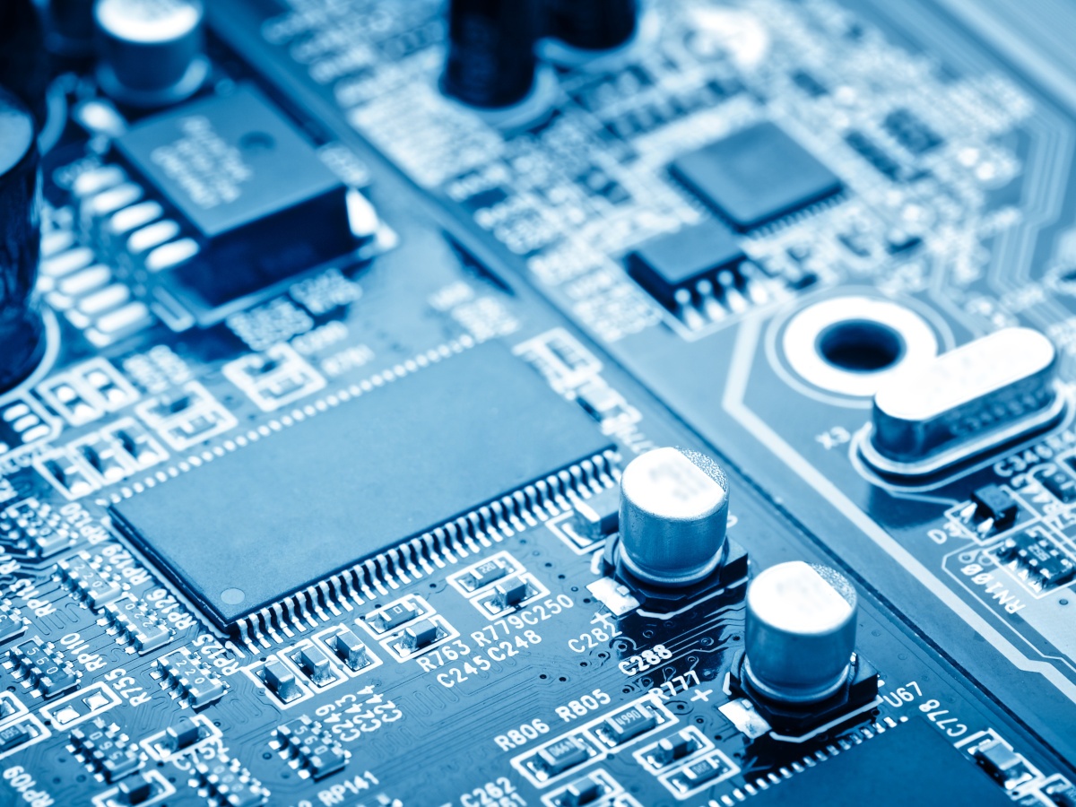 A semiconductor chip and technology in blue lighting.