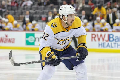 Nashville Predators forward Ryan Johansen reacts during 2022 game. Nashville Predators forward Ryan Johansen reacts during 2022 game.