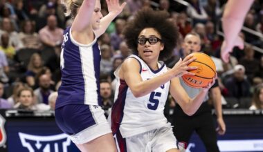 Mar 7, 2026; Kansas City, MO, USA; TCU Horned Frogs guard Olivia Miles (5) attempts to drive the ball past Kansas State Wildcats forward Nastja Claessens (4) during the second half at T-Mobile Center.