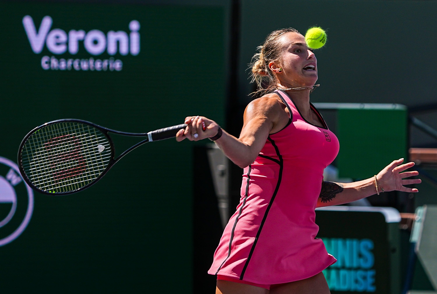 Aryna Sabalenka hits a forehand against Victoria Mboko at the 2026 BNP Paribas Open in Indian Wells.
