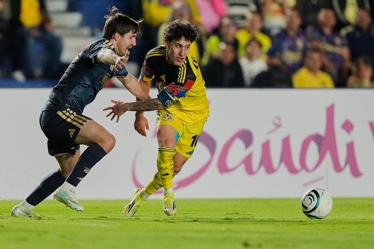 Alejandro Zendejas of Mexico's América, right, and Indiana Vassilev of the United States' Philadelphia Union vie for the ball during a CONCACAF Champions Cup round of 16 second leg soccer match in Mexico City on Wednesday.