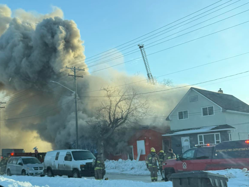 Winnipeg fire crews battle large North End blaze Monday morning