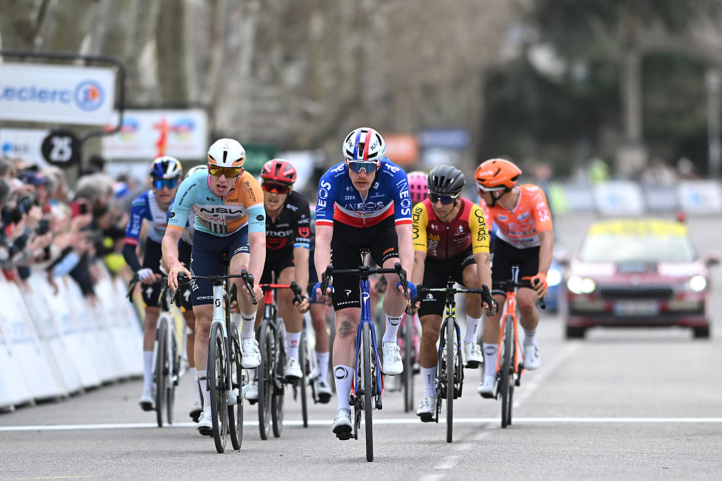APT, FRANCE - MARCH 13: (L-R) Lewis Askey of Great Britain and Team NSN Cycling and Dorian Godon of France and Team INEOS Grenadiers cross the finish line during the 84th Paris-Nice 2026, Stage 6 a 179.3km stage from Barbentane to Apt 234m / #UCIWT / on March 13, 2026 in Apt, France. (Photo by Szymon Gruchalski/Getty Images)