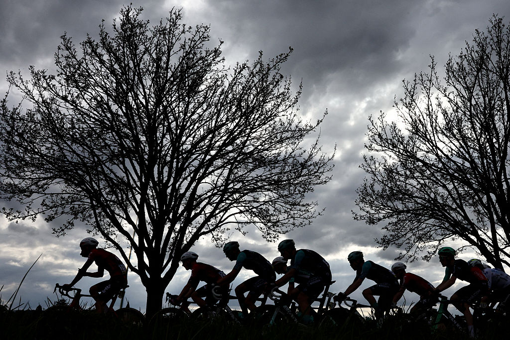 The pack rides during the 2nd stage of the Paris-Nice cycling race, 187 km between &Eacute;p&ocirc;ne and Montargis, on March 9, 2026. (Photo by Anne-Christine POUJOULAT / AFP)