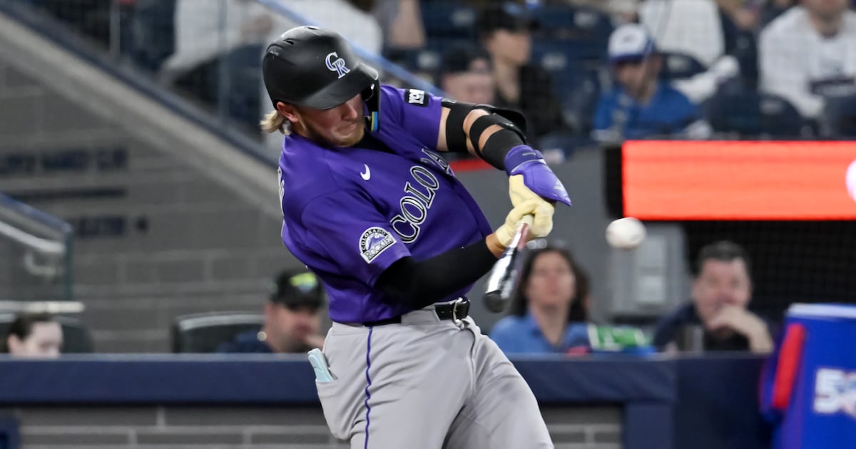 Johnston's two-run homer kicks off seven-run inning as Colorado Rockies roll past Toronto Blue Jays