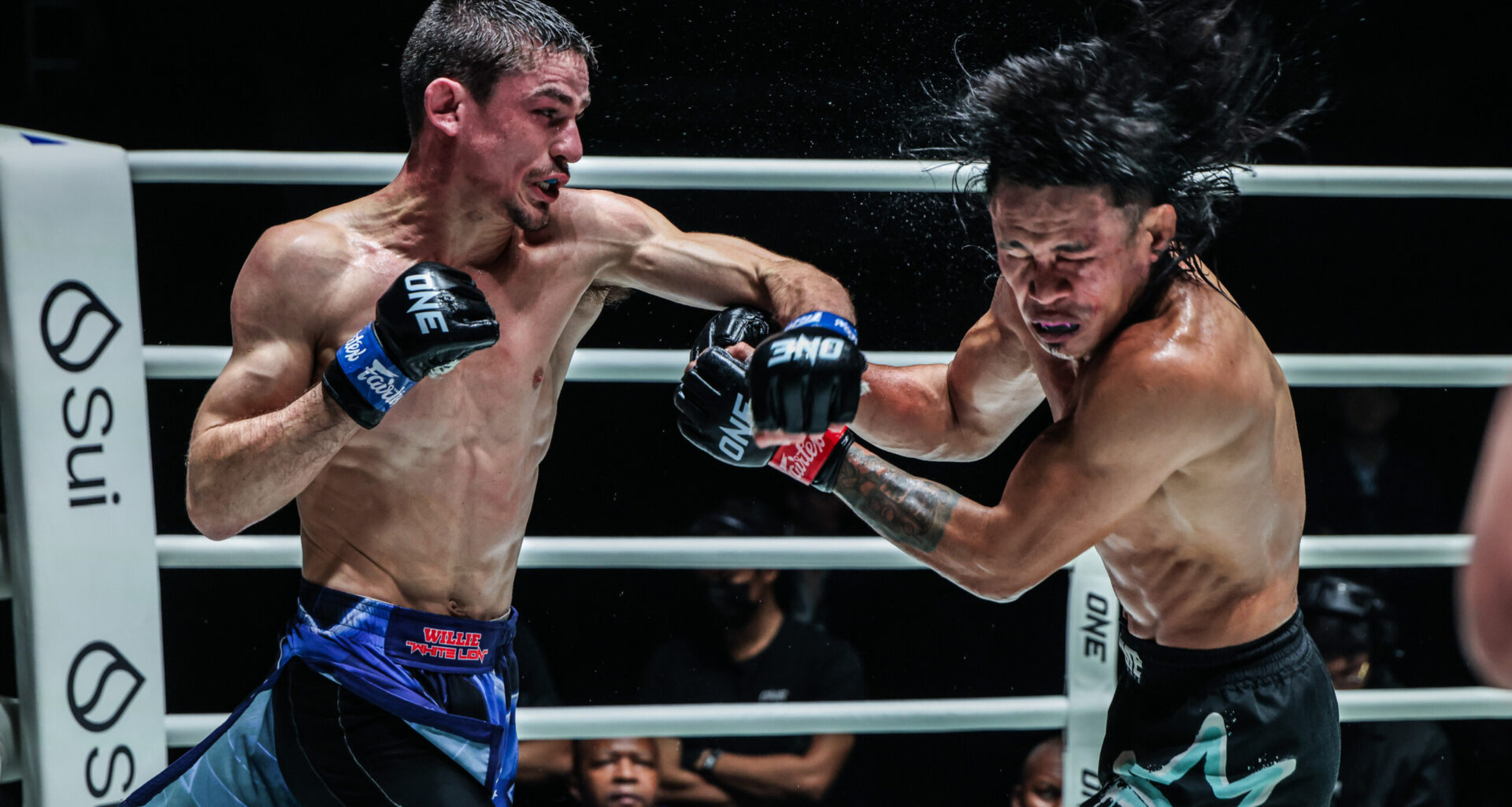 MMA fighter Willie van Rooyen cracks Jeremy Miado in the head