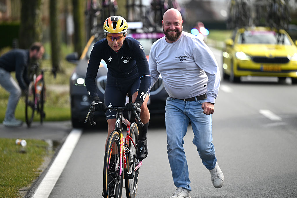BRUGES, BELGIUM - MARCH 26: Femke Gerritse of Netherlands and Team SD Worx - Protime assisted by the team car during the 9th Ronde van Brugge - Tour of Bruges 2026, Women's Elite a 143.7km one day race from Bruges to Bruges on March 26, 2026 in Bruges, Belgium. (Photo by Luc Claessen/Getty Images)