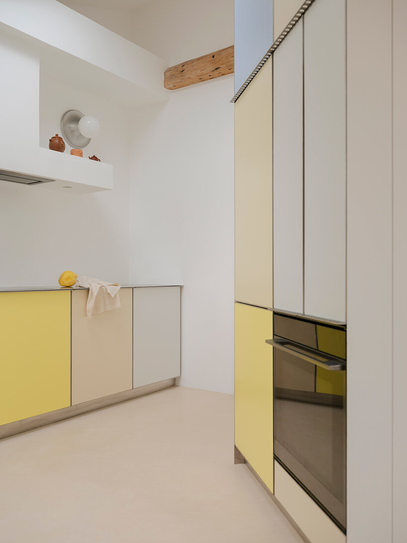 acte deux unifies parisian 'maids' rooms' into 55-square-meter attic apartment - 3