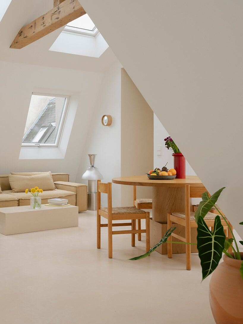 acte deux unifies parisian 'maids' rooms' into 55-square-meter attic apartment - 10
