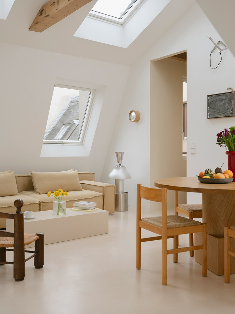 acte deux unifies parisian 'maids' rooms' into 55-square-meter attic apartment - 9