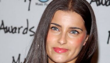Nelly Furtado turns heads in strapless dress at star studded awards