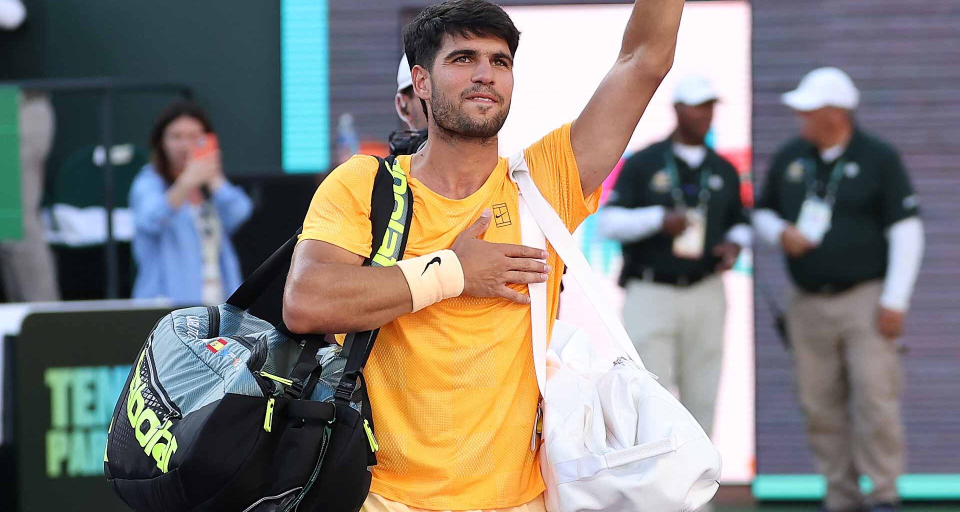 Carlos Alcaraz waves to the Indian Wells crowd on Saturday after suffering his first loss of the season.