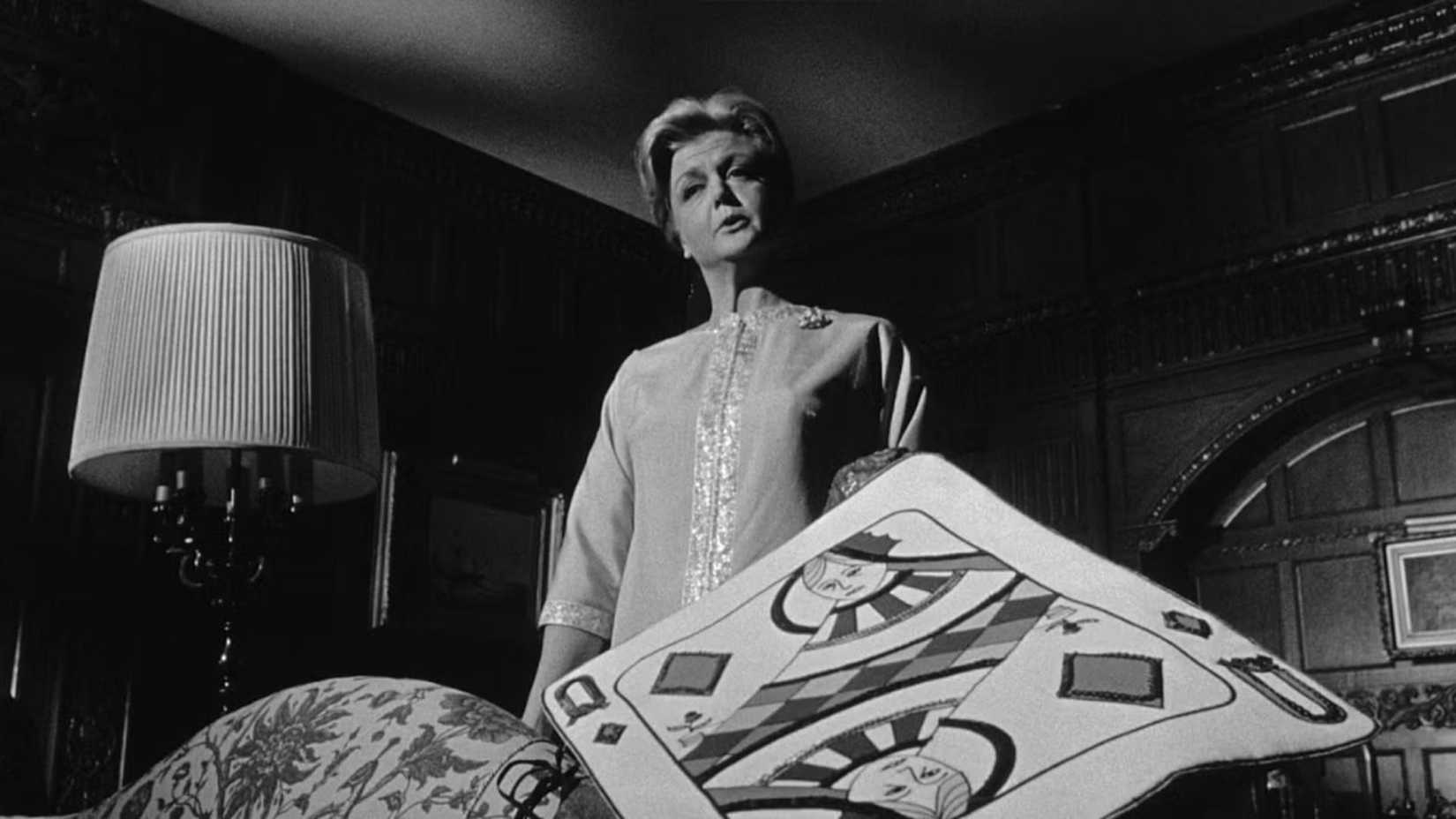 Angela Lansbury as Mrs Eleanor Shaw Iselin with a playing card in The Manchurian Candidate