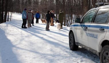 Guards keeping walkers out of Angell Woods