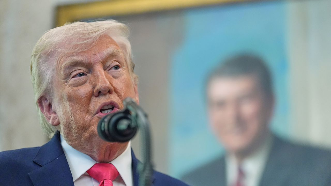 US President Donald Trump speaks in the Oval Office of the White House, on Tuesday, March 24, in Washington, DC.
