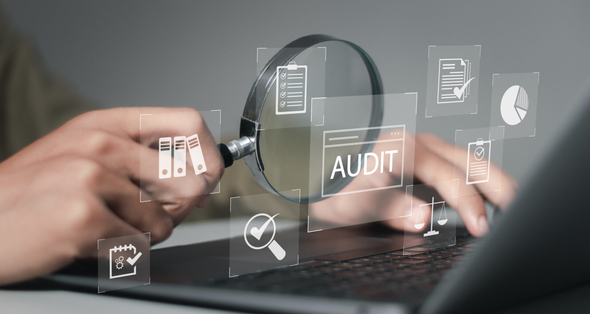 Businessman using laptop computer to audit and evaluate corporate financial statements for Audit business concept. Auditing financial accounts within the organization.