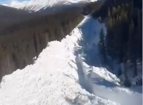 Conrad Janzen, a visitor safety specialist with Parks Canada, estimates the size of the massive slide of snow and debris at 250 meters long and six to eight meters high.
