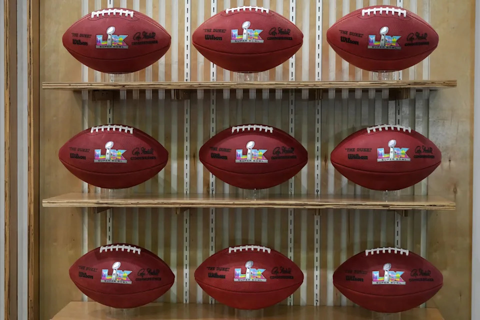 Wilson Duke official footballs with the Super Bowl 60 logo at the Super Bowl LX Experience at the Moscone Center.