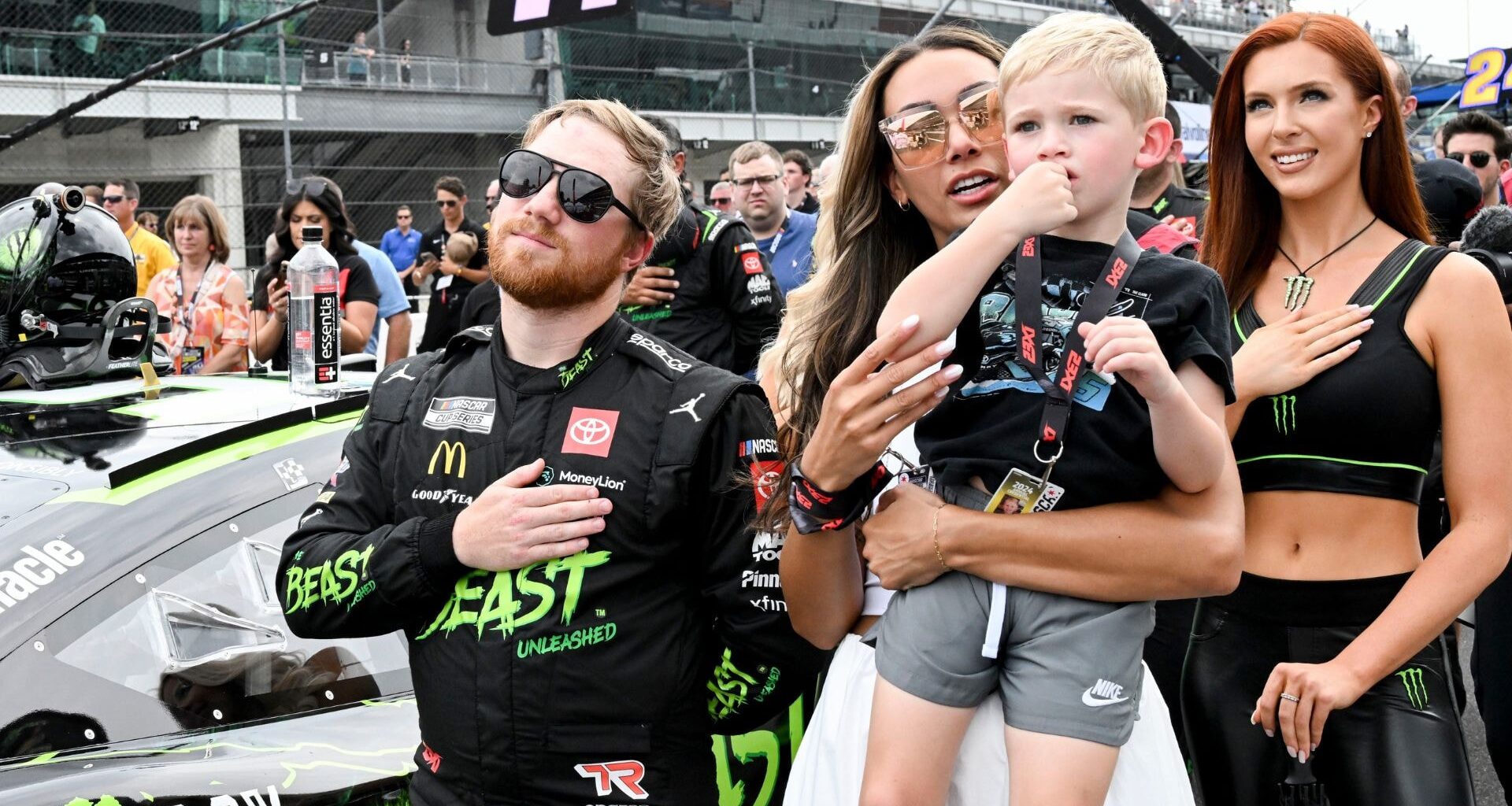 Alexa Reddick holding Rookie after Tyler Reddick's Daytona win