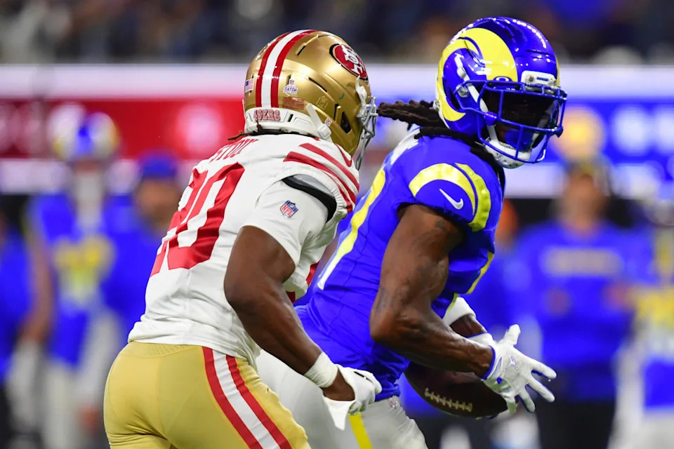 Oct 2, 2025; Inglewood, California, USA; Los Angeles Rams wide receiver Davante Adams (17) makes a catch against San Francisco 49ers cornerback Upton Stout (20) during the second half at SoFi Stadium. Mandatory Credit: Gary A. Vasquez-Imagn Images© Gary A&period; Vasquez-Imagn Images