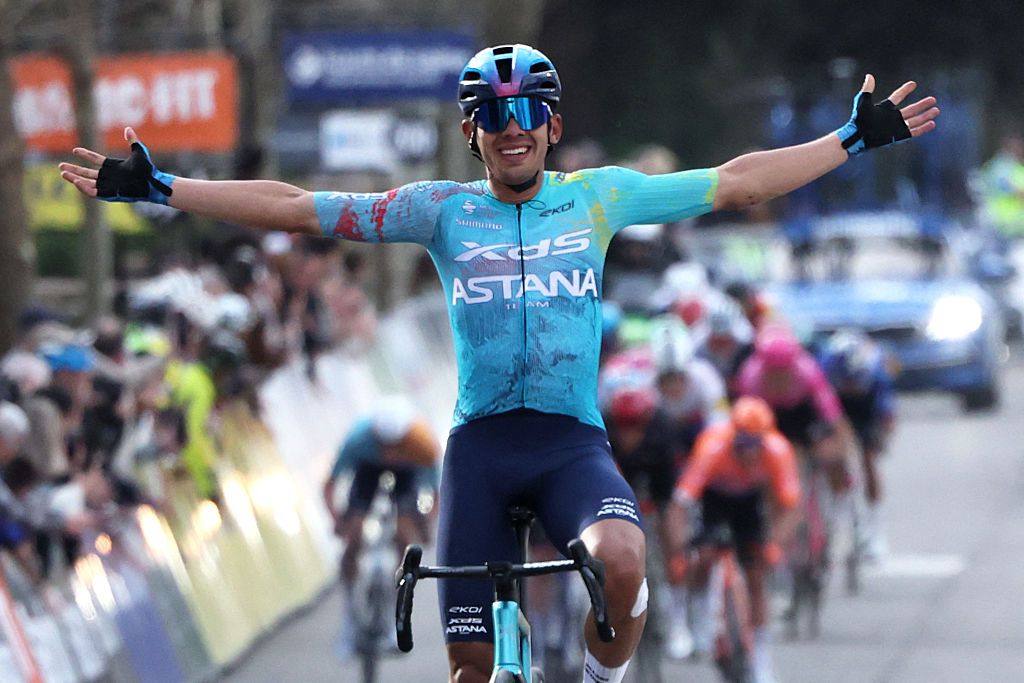 XDS Astana Team's Colombian rider Harold Tejada celebrates as he crosses the finish line to win the 6th stage of the Paris-Nice cycling race, 179.3 km between Barbentane and Apt, on March 13, 2026. (Photo by Anne-Christine POUJOULAT / AFP)