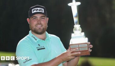 Dan Bradbury holds the Joburg Open trophy after winning the 2026 event