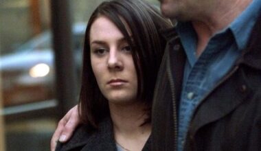 Kerry Sim, formerly known as Kelly Ellard, and her father, Lawrence, leave the Vancouver courthouse for dinner, March 30, 2000. THE CANADIAN PRESS/Adrian Wyld