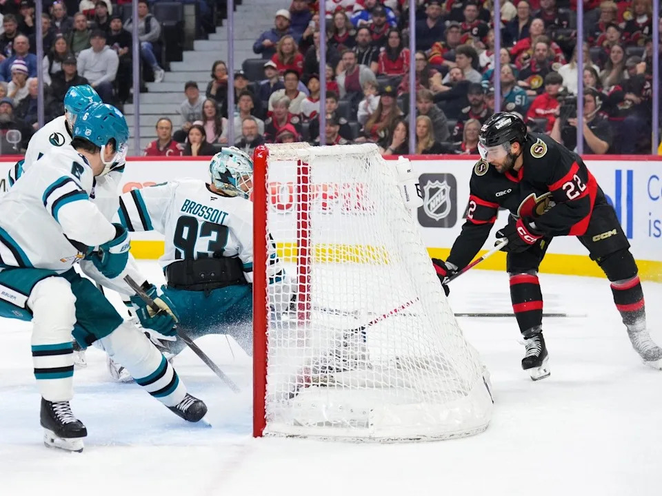  Michael Amadio of the Ottawa Senators attempts a wraparound on Laurent Brossoit of the San Jose Sharks in the second period at Canadian Tire Centre on March 15, 2026.