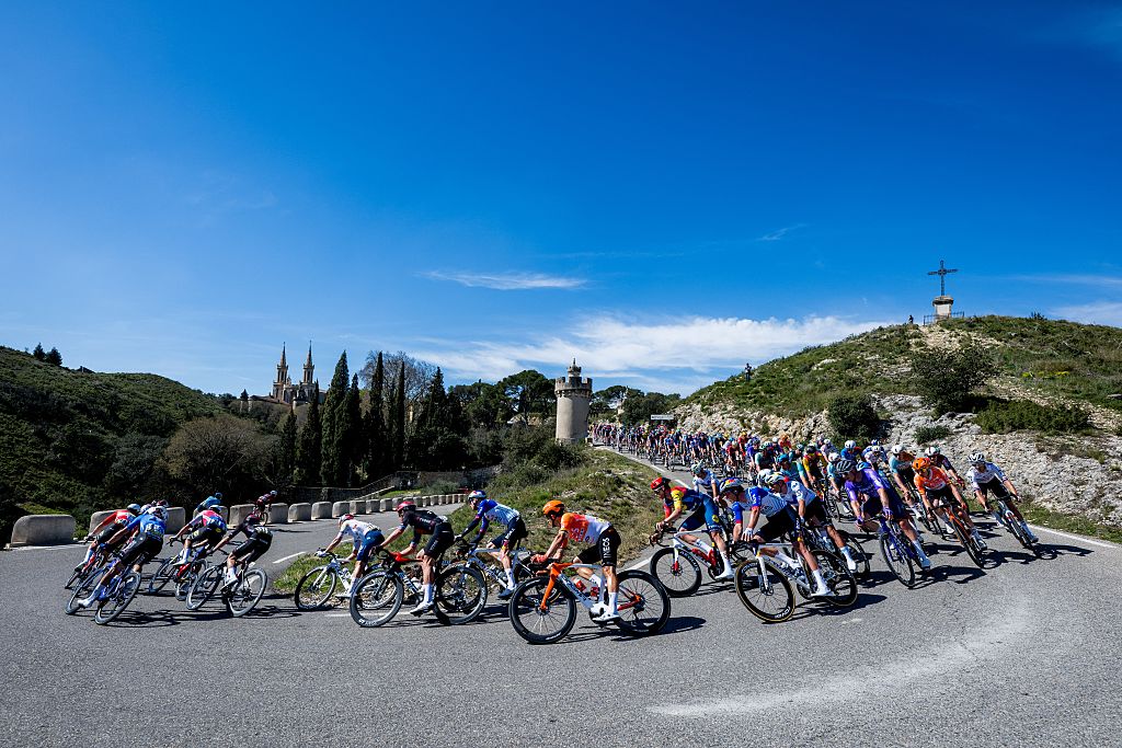 The pack of riders pictured in action during the sixth stage of 84th edition of the Paris-Nice cycling race, a race from Barbentane to Apt (179,3 km), on Friday 13 March 2026. BELGA PHOTO DAVID PINTENS (Photo by DAVID PINTENS / BELGA MAG / Belga via AFP)