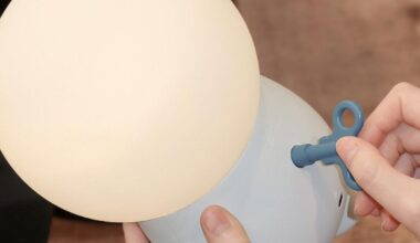 buddy portable mood lamp’s wind-up key encourages interaction