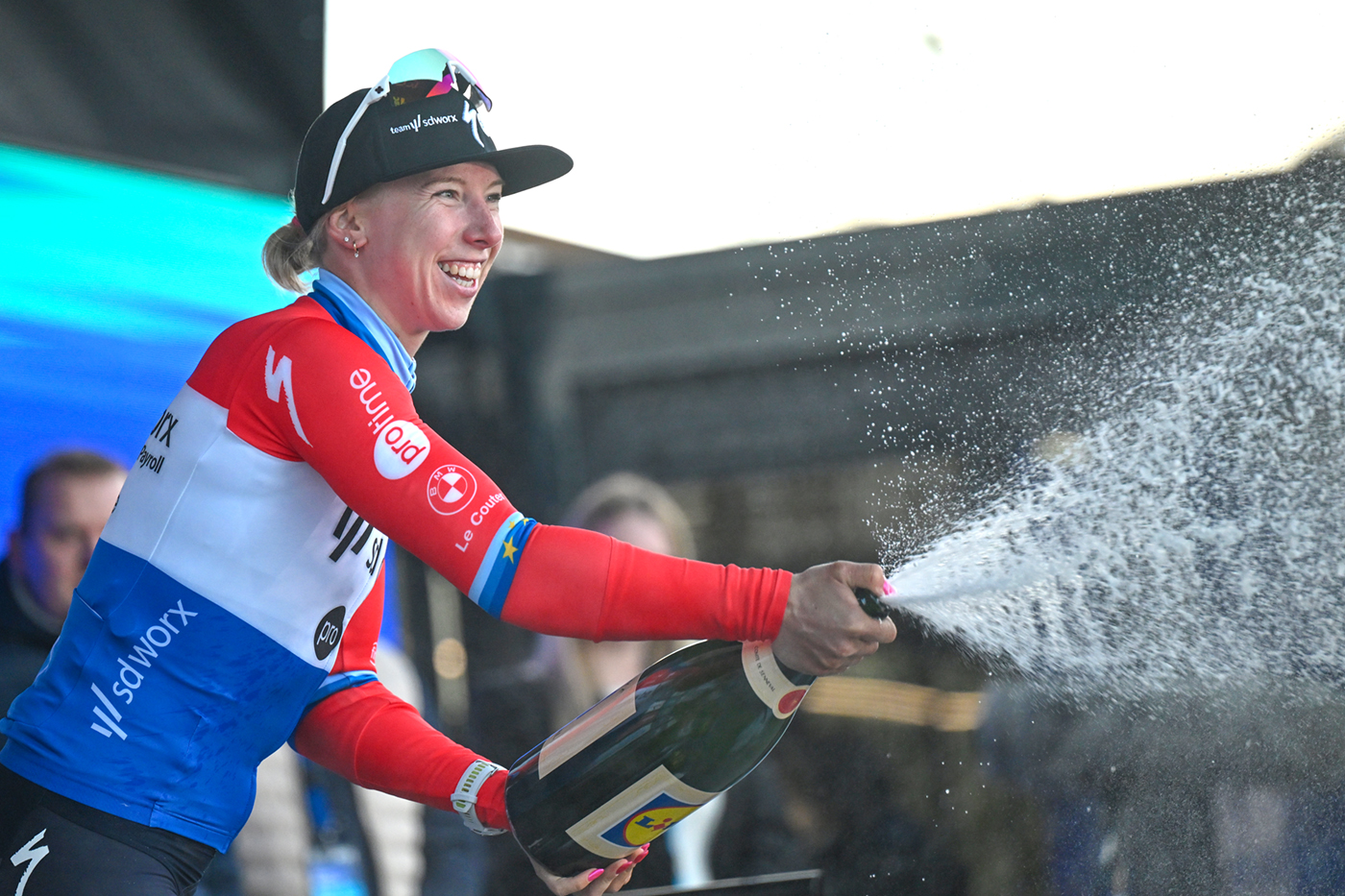 NIVONE, BELGIUM - FEBRUARY 28: Lorena Wiebes of Netherlands and Team SD Worx - Protime celebrates at podium as third place winner during the 21st Omloop Het Nieuwsblad 2026, Women's Elite a 137.2km one day race from Ghent to Ninove / #UCIWWT / on February 28, 2026 in Ninove, Belgium. (Photo by Luc Claessen/Getty Images)
