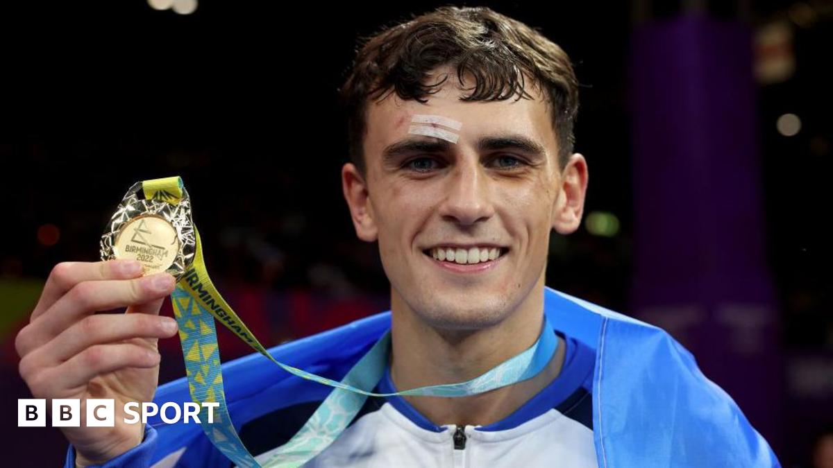 Gold medalist Reese Lynch of Team Scotland celebrates during the Men's Boxing Over 60kg-63.5kg (Light Welterweight) medal ceremony on day ten of the Birmingham 2022 Commonwealth Games at NEC Arena on August 07, 2022 on the Birmingham, England