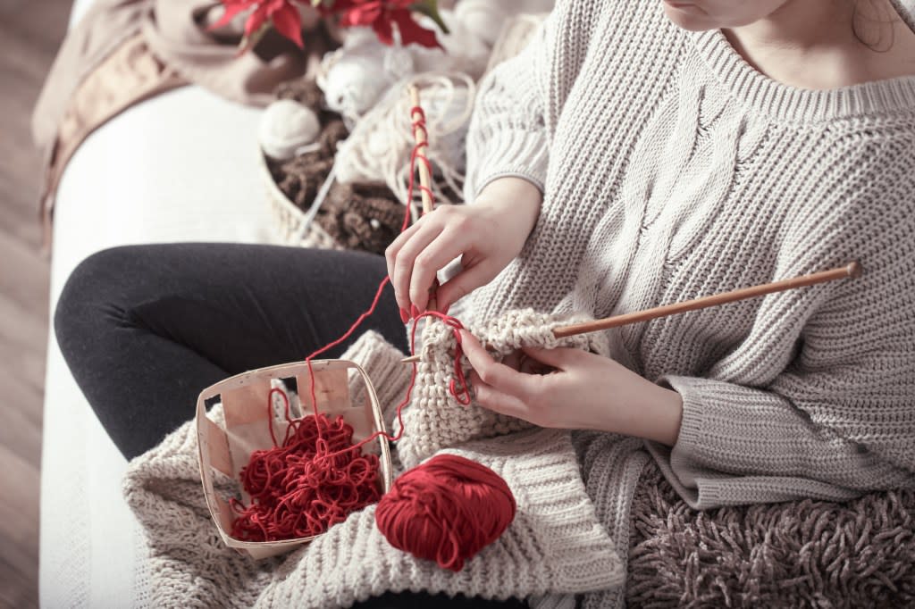 The study found that engaging in mentally stimulating activities while sitting, like knitting, may help protect against dementia. puhimec – stock.adobe.com