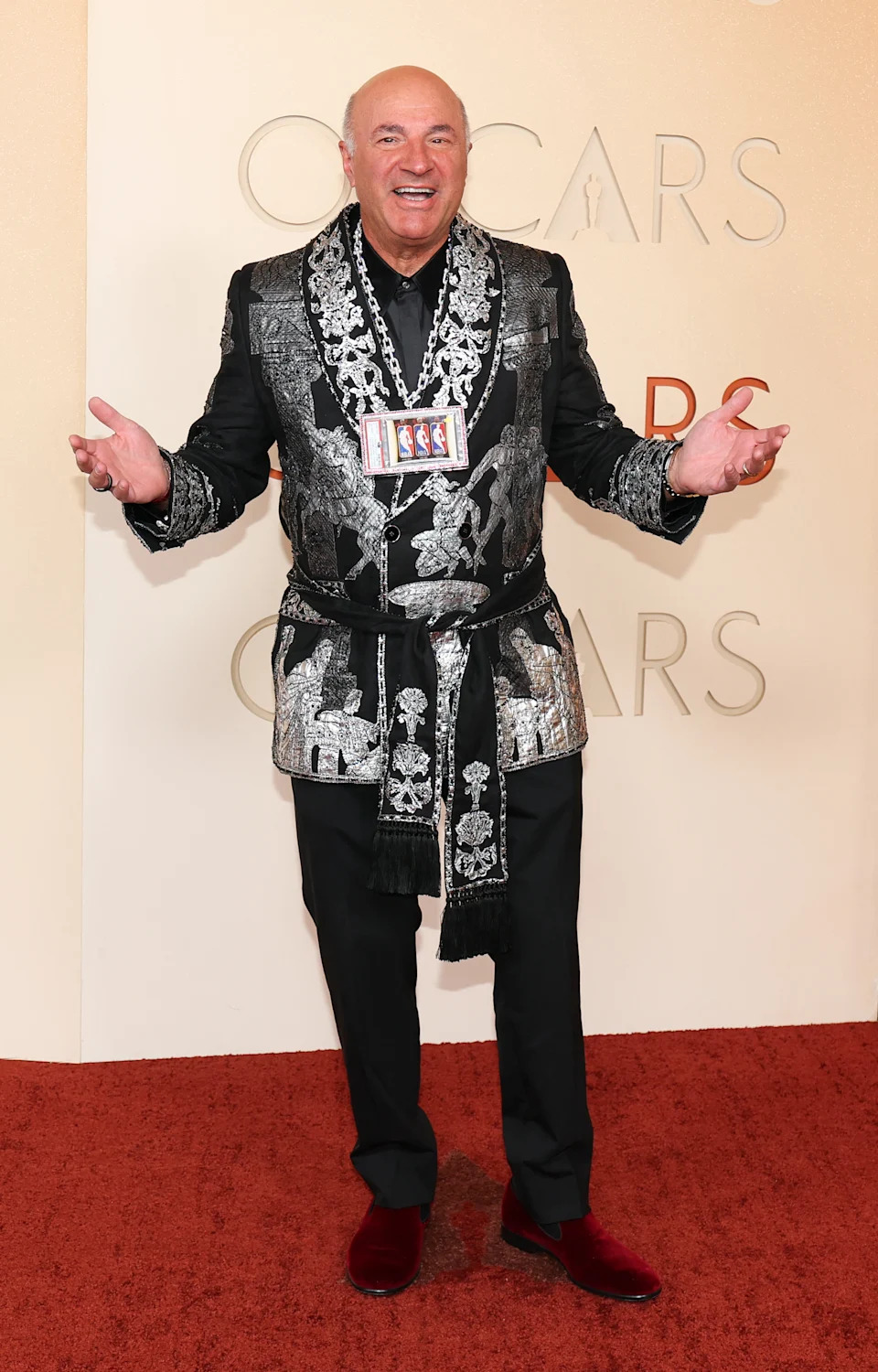 US businessman Kevin O'Leary wears a diamond-encrusted necklace featuring a rare dual 