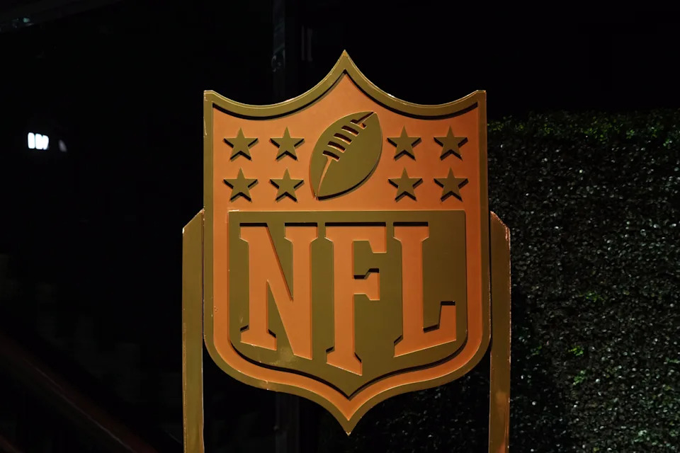 A NFL shield logo at the NFL Honors Red Carpet before Super Bowl LX at Palace of Fine Arts.