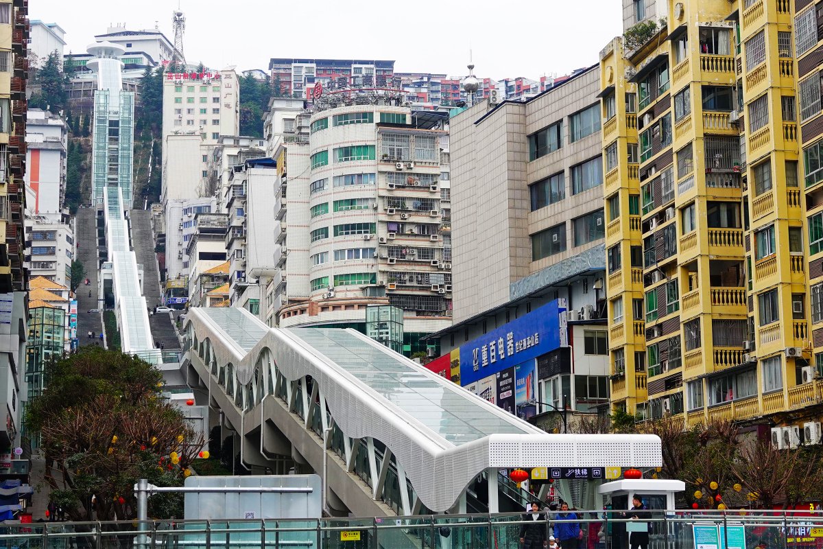 China Built the World's Largest Outdoor Escalator, and It's a Modern Marvel That Looks Like It Never Stops Rising Into the Sky