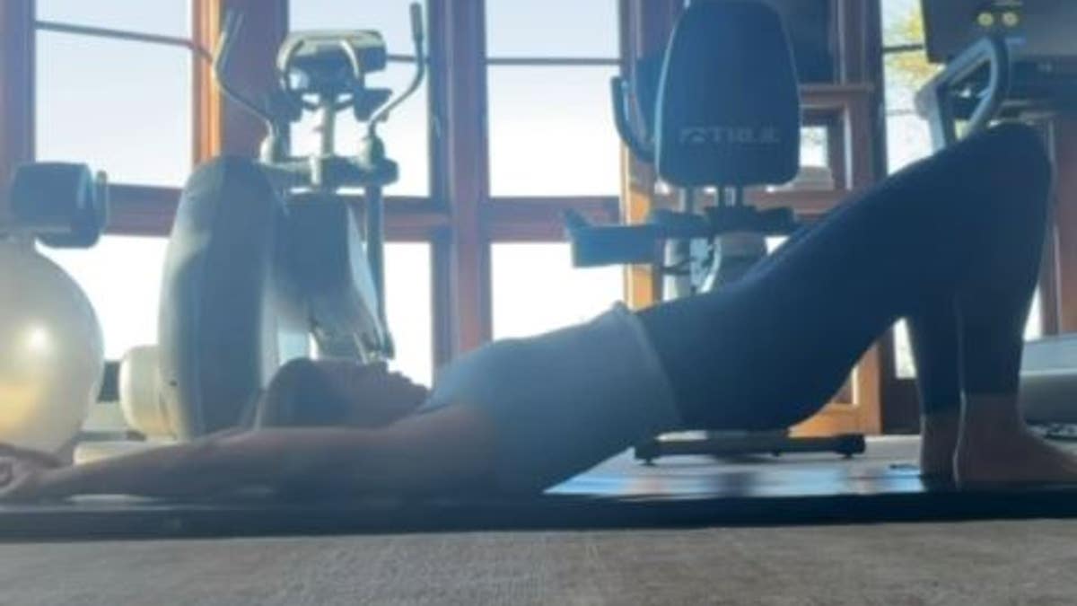 Cindy Crawford doing yoga