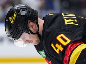 Vancouver Canucks' Elias Pettersson (40) waits to take a faceoff during the third period of an NHL hockey game against the Edmonton Oilers, in Vancouver, on Saturday, January 17, 2026.